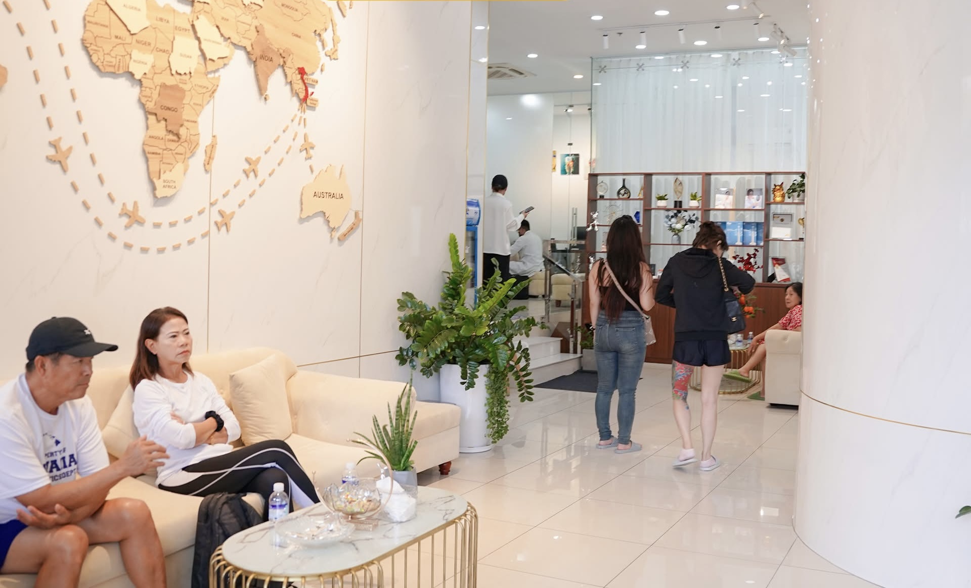 The clinic welcome area with a world map on the wall